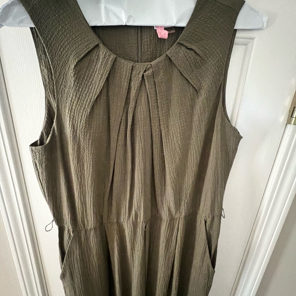 Calvin Klein - Like new, sleeveless, olive green romper, belted.